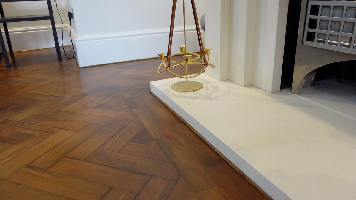 ThermaSkirt Deco profile in a traditional living room